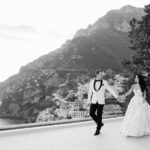 First look wedding moment in Italy: Bride and groom sharing an intimate moment before the ceremony