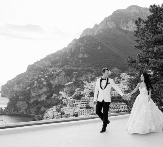 First look wedding moment in Italy: Bride and groom sharing an intimate moment before the ceremony